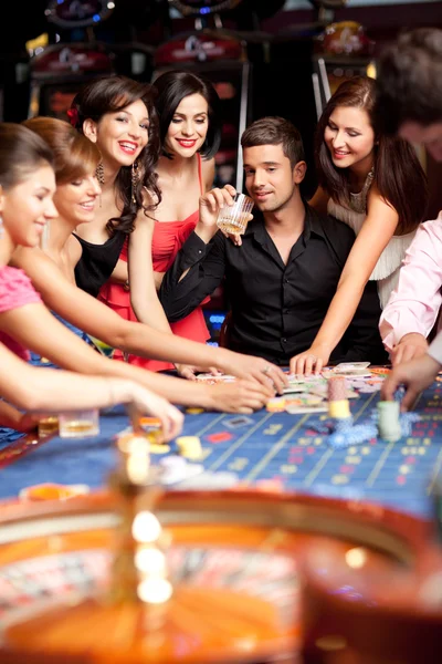Winning roulette friends — Stock Photo #5939891