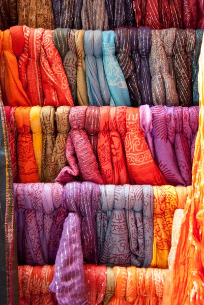 Colorful scarves in a row