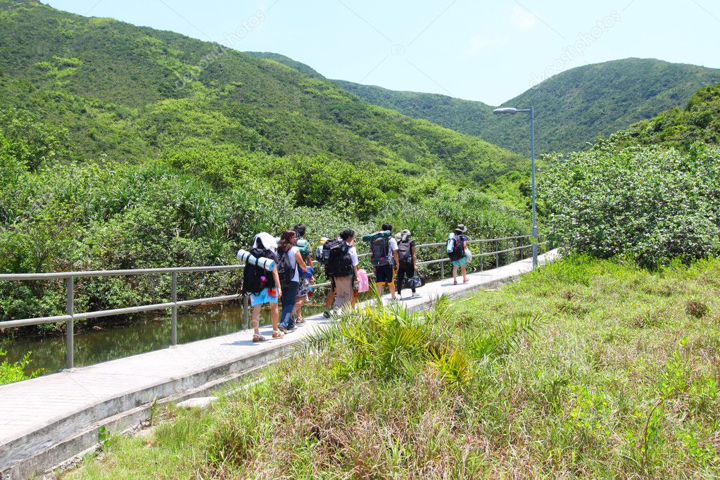 Asian hiking team in mountains of Hong Kong — Stock Photo © kawing921