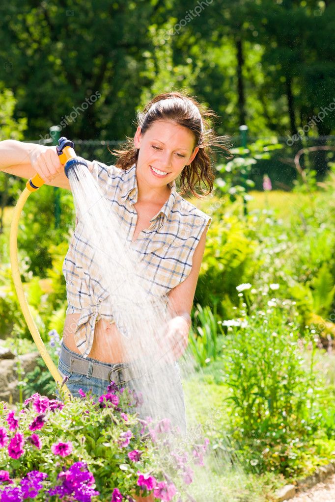 http://static6.depositphotos.com/1037778/644/i/950/depositphotos_6441196-stock-photo-summer-garden-smiling-woman-watering.jpg
