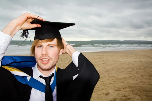 Graduation. Student graduating cap gown