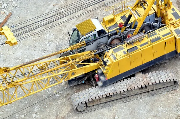 Yellow construction crane truck
