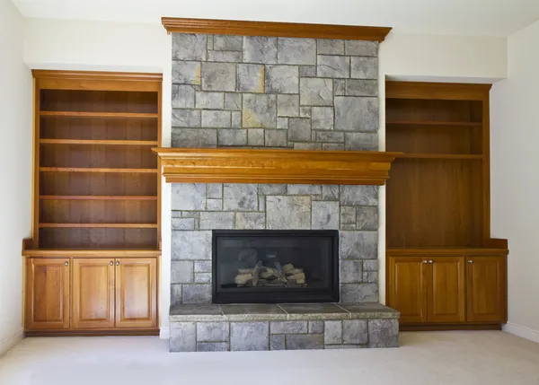 Open Fireplace and Book Shelf