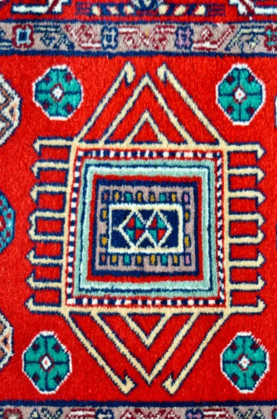 Colored wool handmade carpet closeup