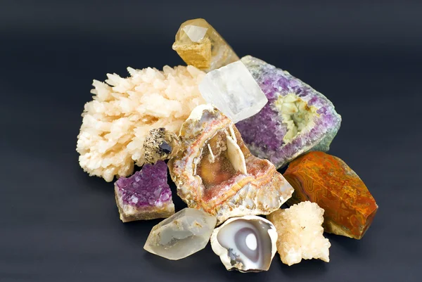 Composition of natural gem stones on a black background