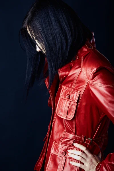Woman in red leather jacket