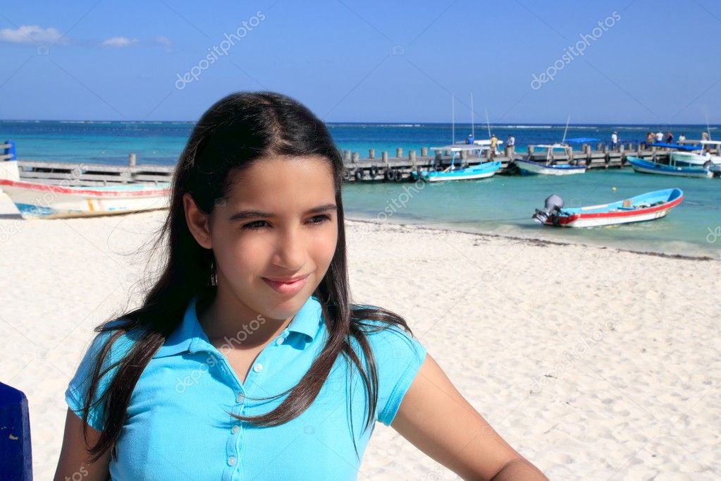 Latin teen tourist girl in caribbean puerto morelos beach