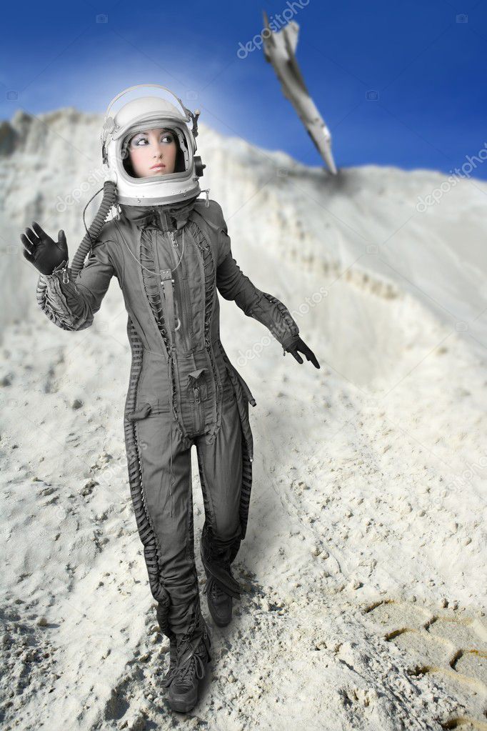 http://static6.depositphotos.com/1053932/549/i/950/depositphotos_5495319-Astronaut-fashion-stand-woman-space-suit-helmet.jpg