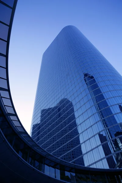 Blue mirror glass facade skyscraper buildings