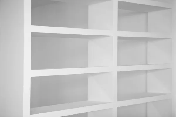 Bookshelf in white empty blank shelfs