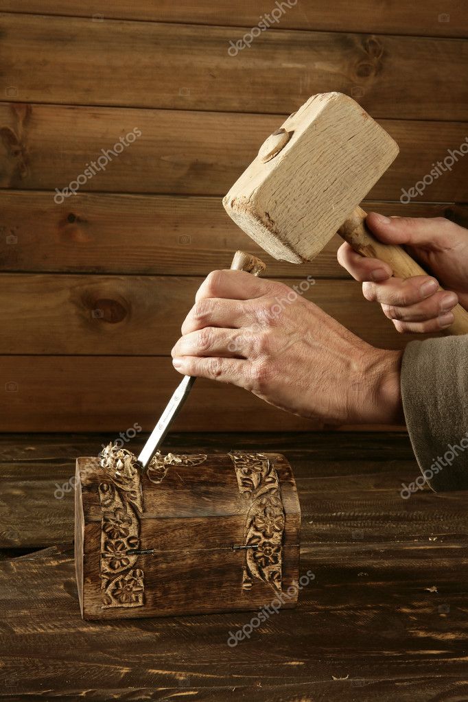 Gouge wood chisel carpenter tool hand hammer - Stock Image