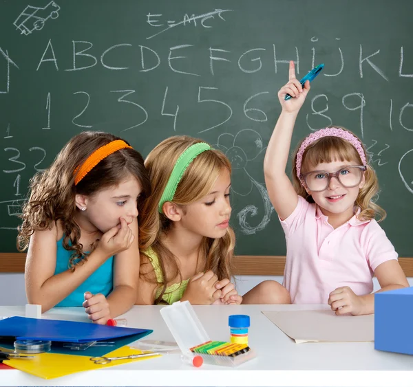 Boring student with clever children girl raising hand