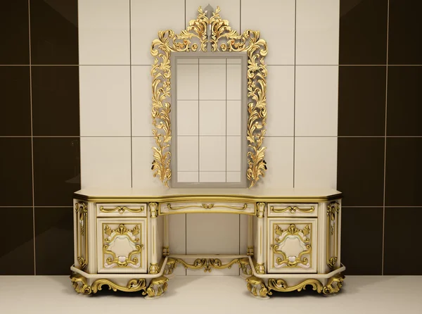 Baroque gold mirror with royal chest
