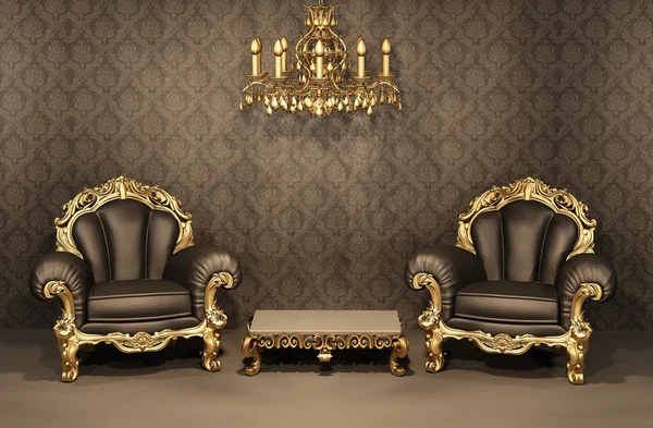 Armchairs with gold frame in old interior. Luxurious furniture.