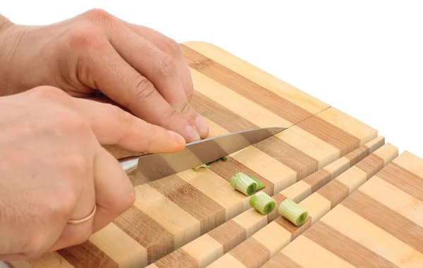 Knife cuts wood cutting board