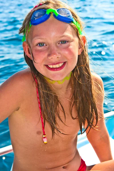 Young girl at the beach with wet hair by Joerg Hackemann Stock Photo