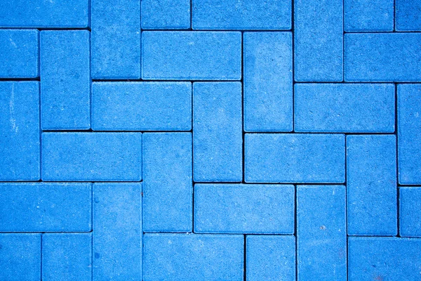 pavement pattern made with cast concrete blocks in blue color