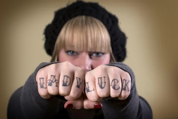 Lady luck tattoo on knuckles