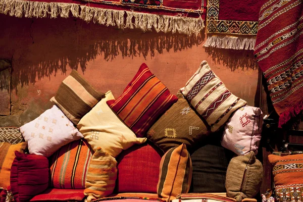 Moroccan cushions in a street shop in medina souk