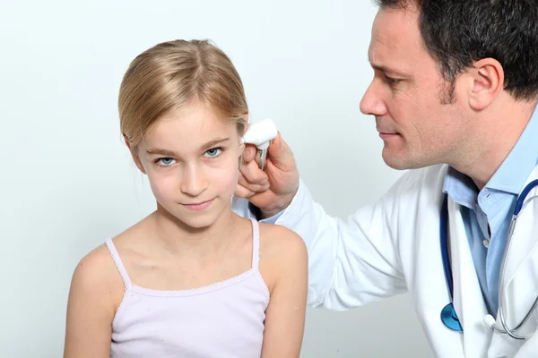 Doctor doing child medical check-up