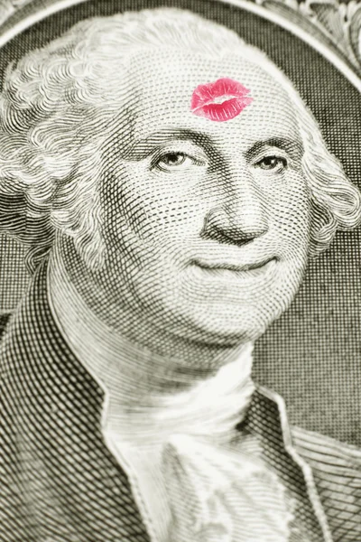 1 dollar bill. kiss on one dollar bill