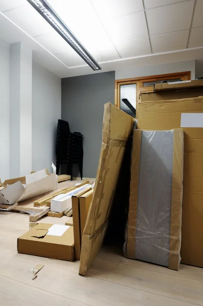 Cardboard boxes in office