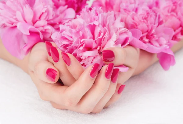 Pink manicure and flower