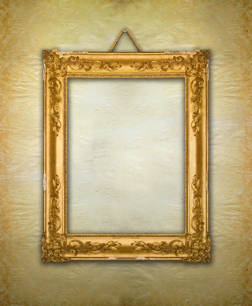 Gold frame, aged wallpaper