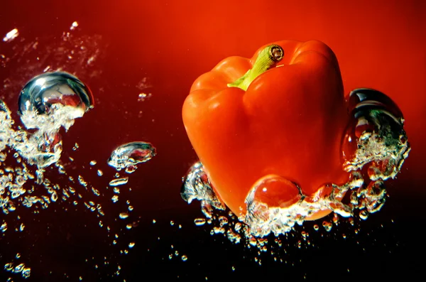 Red sweet pepper in water, sweet paprika