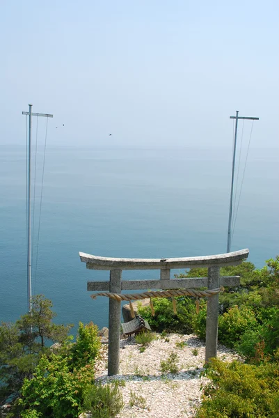 Majestic torii gate overlooking the ocean