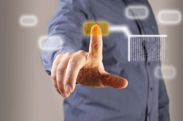 Hand pushing a button on a touch screen interface
