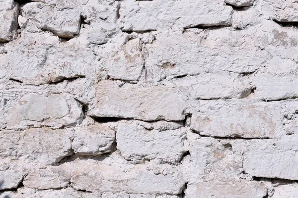 Stone masonry wall made with large rounded stones