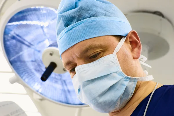 Look of surgeon with lamp