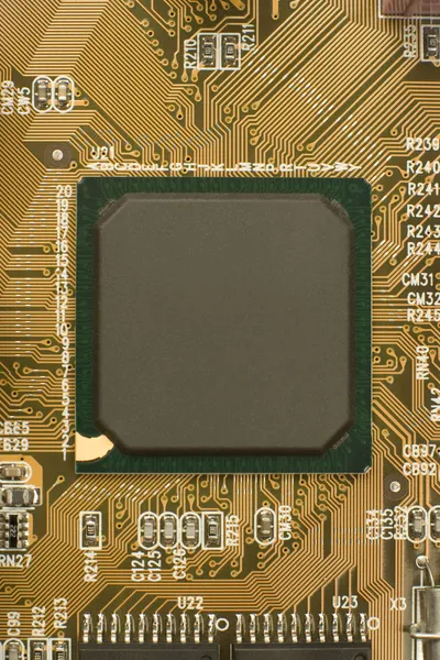 Black chip processor on circuit board — Stock Photo #6189090