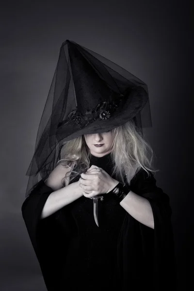 Witch with a dagger in his hands — Stock Photo #6681038