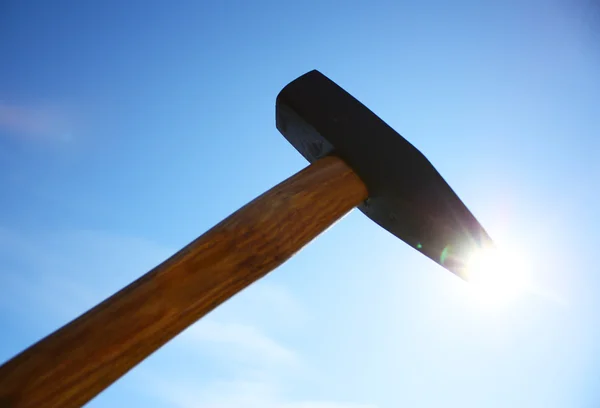 The hammer on the blue sky background