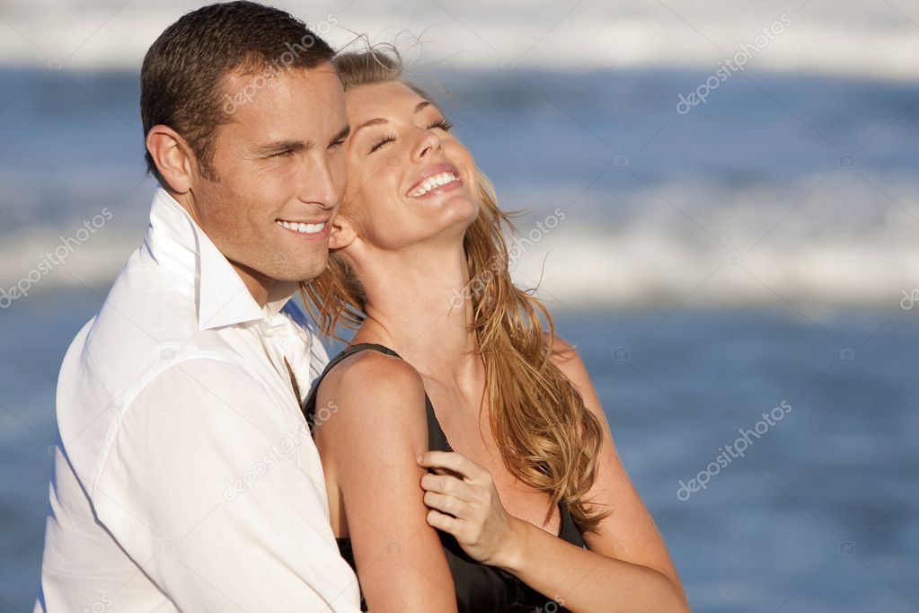 http://static6.depositphotos.com/1135494/647/i/950/depositphotos_6478840-Man-and-Woman-Couple-Laughing-In-Romantic-Embrace-On-Beach.jpg