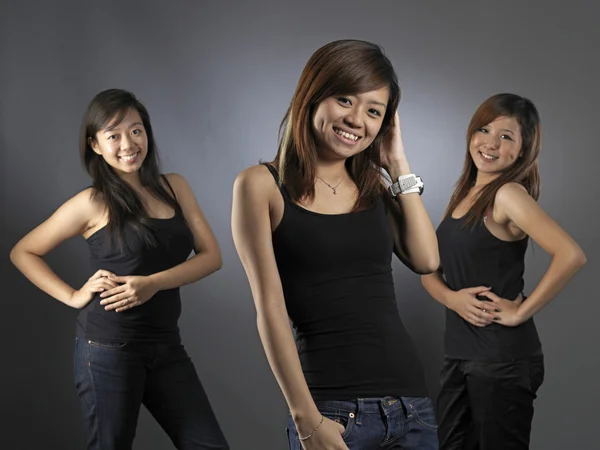 Group of 3 asian chinese girls in various poses