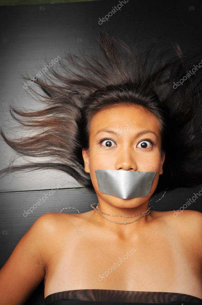 Asian chinese girl with tape ov...