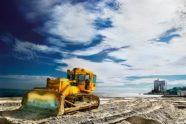 Tractor on a sandy beach