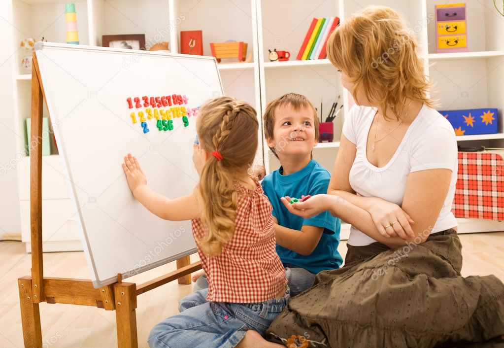 http://static6.depositphotos.com/1144191/643/i/950/depositphotos_6430588-Kids-doing-math-exercises-with-mom.jpg