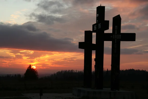 Christian crosses in the sunset