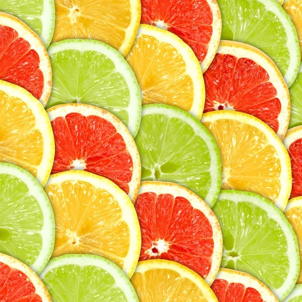 Hintergrund mit Zitrusfrucht-Scheiben — Stockfoto