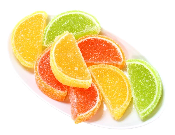 Édességek, mint a Citrusféle gyümölcsök fehér tányérra csoportja흰색 접시에 감귤으로 자의 그룹 — Stock Fotó
