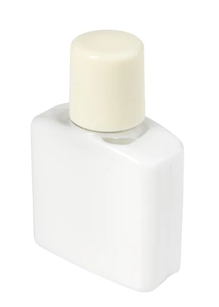 Crema cosmética blanca en botella transparente — Foto de Stock