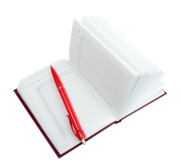 Порожній відкритий щоденник і червона кулькова ручка — стокове фото