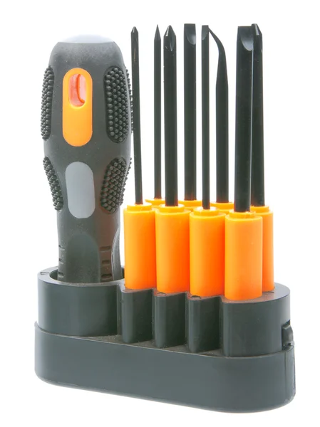Set of orange-black screwdrivers with bits — Stock Photo, Image