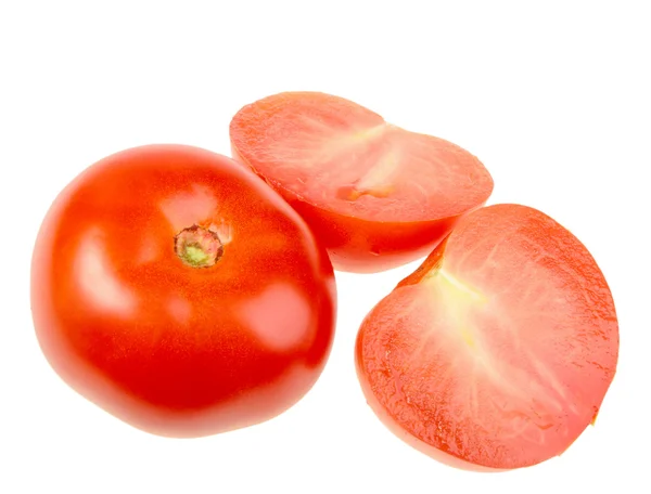 Kruis en volledige rijpe rode tomaten — Stockfoto