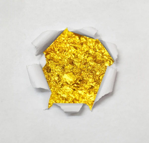 Zerrissenes Papier Hintergrund mit Gold strukturiert. — Stockfoto