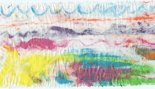 Macchie a colori di una vernice su un materiale — Foto Stock